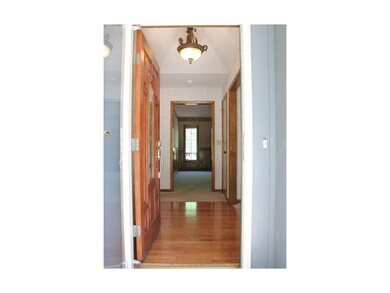Gleaming hardwood entry welcomes you