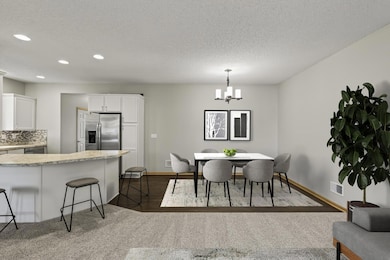 View of the dining/kitchen area from the living room.