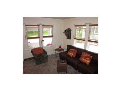 Living Room. Bright & Airy!  Hardwood floor under 