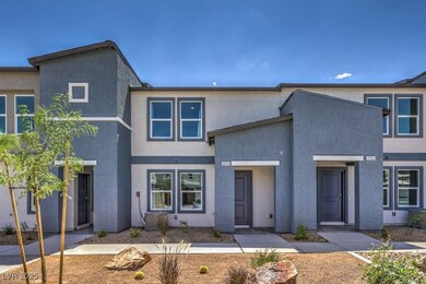 View of property with stucco siding
