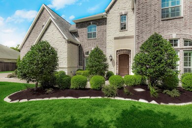 Front perspective with well curated landscaping