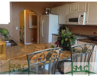 Kitchen. GRANITE COUNTERTOPS WITH CUSTOM BREAKFAST