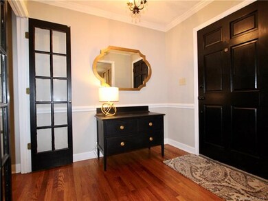 Nice Foyer Entrance with Hardwood Floors with French Doors and to your left opens to the large Formal Dining Room which opens to the Great Room with Built-ins and Fireplace! Another set of French Doors lead into the Office