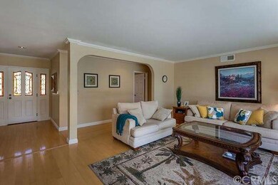 Enter to find marble & wood floors throughout.