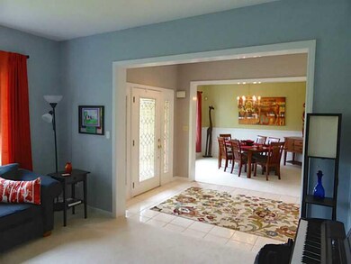 Entry/Foyer. Open entry connects dining room & liv