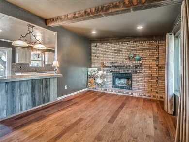 Features include a vaulted ceiling, fireplace and 