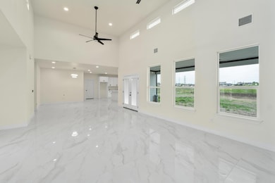 Unfurnished living room featuring visible vents, 
