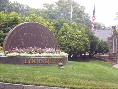 Entry. ENTRANCE FROM ANGEL ROAD...LOUISQUISSET HAS