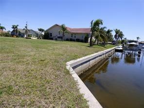 This angle shows the concrete sea wall. The longer view is your seawall. The shorter angled wall (foreground) is the adjacent property owner smaller wall. Tide is lower at the time the photo was taken.