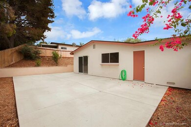 New retaining wall and concrete side walk at side of home and new slab in back yard