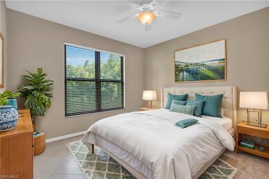 Bedroom with ceiling fan and light tile patterned 