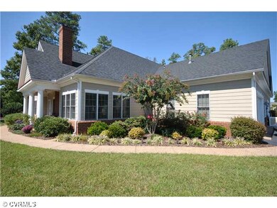 Exterior Front - Pretty landscaping and private do