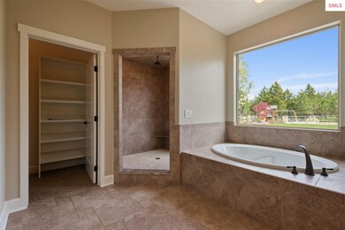 Master Bath with a big shower and soaker tub.
