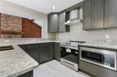 Kitchen with all new appliances, cabinets and coun