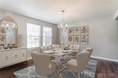 VIRTUALLY STAGED - Dining Room / front flex room