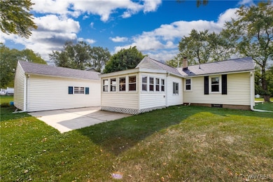 Back Patio and Enclosed back porch