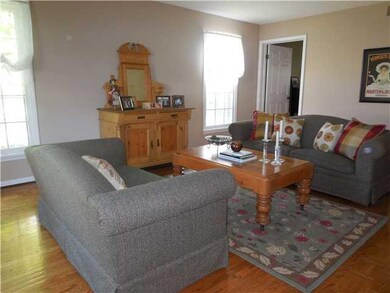 Living Room. Gleaming hardwoods, crown moldings an
