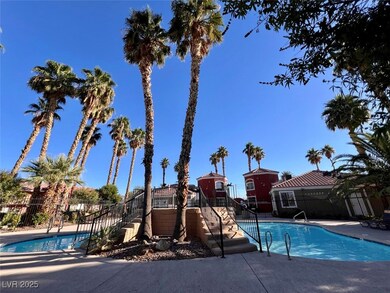 Community pool featuring a patio