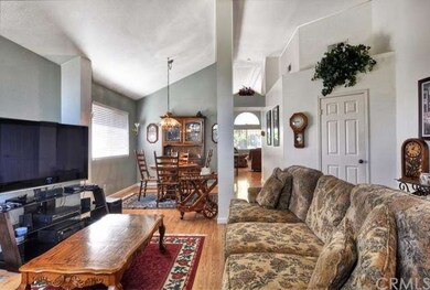 Living and Dining areas. The elevated ceilings exp