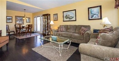 High-quality wood laminate floors make this home b