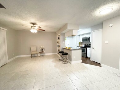 This condo offers an Open Floor plan concept.