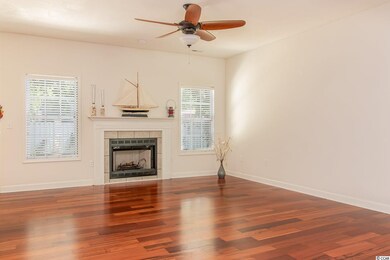 Light and Bright, with gleaming wood floors throug