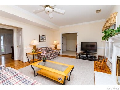 Family Room - 20 x 13 - Hardwood Floors - Gas Fire