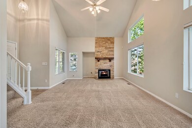 Vaulted Living Room with Fireplace - Vacant
