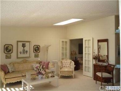 Expanded living room (Note french doors open into 