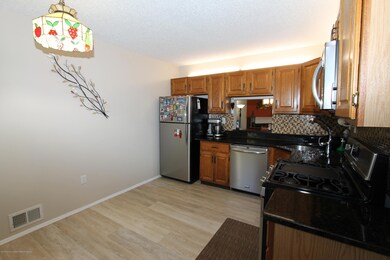 12 Sun Beau Ct unit 11A, Tinton Falls, NJ 07724 - photo 2