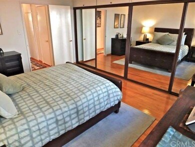 Expansive Master Bedroom with wall to wall sliders