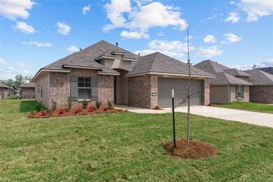 View of front of property featuring a front yard, 