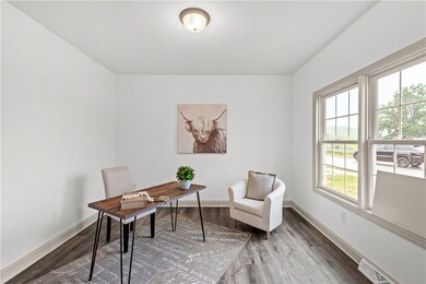 Glass door opens to study or room with options