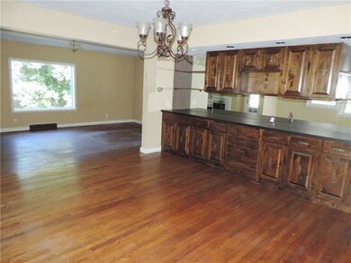 Dining Room. The formal dining room has hardwood f