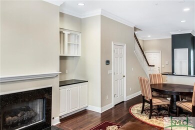 Lovely Gas Log Fireplace and one of two built-in b
