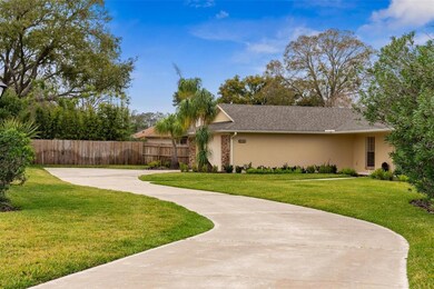 Front Showing Long Driveway