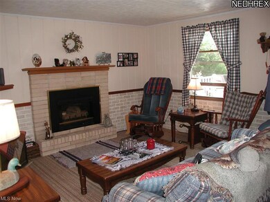 Cozy living room w/frpl
