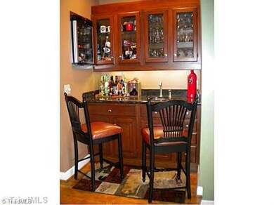 Other. Wet bar with built in wine fridge in a corner of the Great Room.
