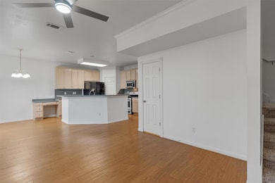 Kitchen looks into the living room. 