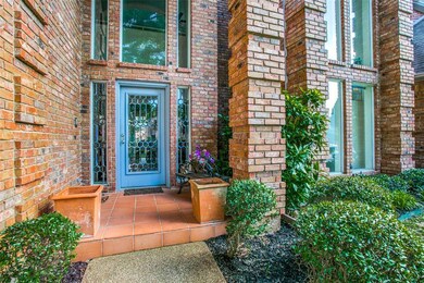 Very welcoming curb appeal and porch greet guests.