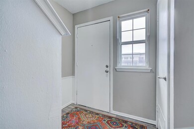 Doorway featuring plenty of natural light