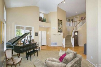 A view of the living room and the spiral staircase
