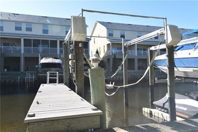 Deeded boat slip, dock with ladder, and boat lift 
