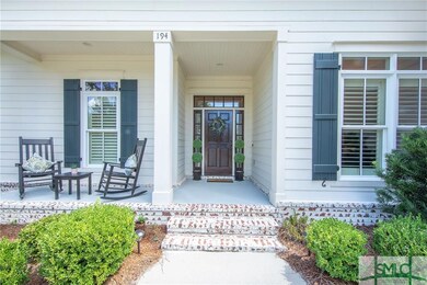 Rocking chair porch with white washed brick stairs
