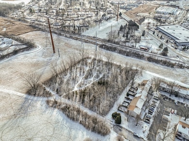 1.95 ACRES ZONED MULTI-FAMILY TOWNHOMES PLATTED &