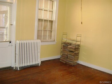 Fireplace..Ceiling Fan side door leads to lovely p