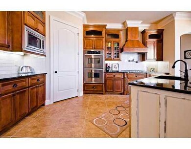 Kitchen. Pantry was designed for another refrigerator to be installed in it.