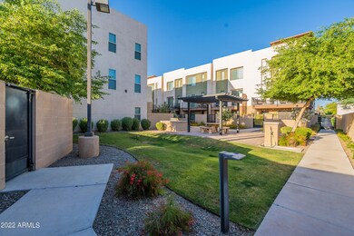 1F ext, NE view (common area BBQ & dog w