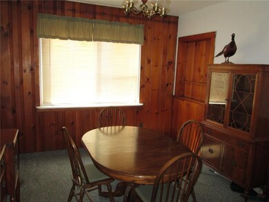 The huge 14x11 dining room with built in cabinets 