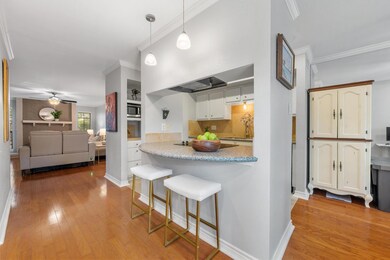 Kitchen featuring wood finished floors, a kitchen